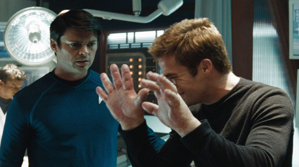 Star Trek. Plot summary and story structure. Dr. McCoy examines Kirk's swollen hands.