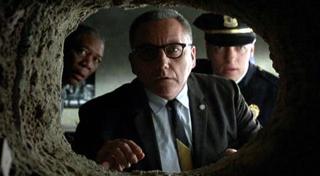 The Shawshank Redemption. Plot summary and story structure. Warden Norton, Captain Hadley and Red discover the hole Andy left in his escape.