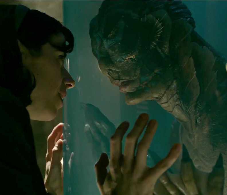 The Shape of Water Story Structure. Elisa and Amphibian Man admire each other through his tank.